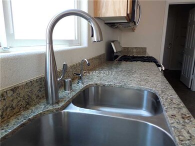 Kitchen. The kitchen has new granite counter tops,