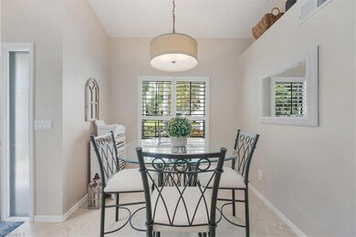 Dining area with healthy amount of natural light and light tile patterned flooring