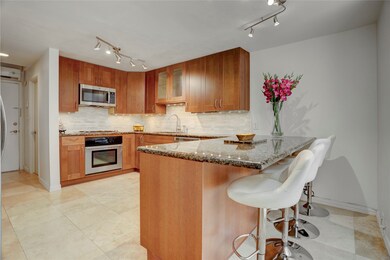 The kitchen features an open layout with a conveni