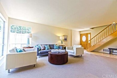 Front entryway and living room from dining area