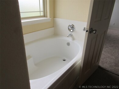 Master has soaking tub and a separate shower.  Two