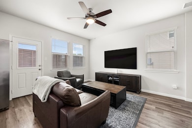 Bright and modern living room with large windows,