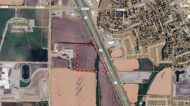 Aerial map of property and surrounding area featuring property boundaries highlighted