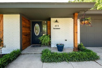 Warm wood accents and beautiful door welcomes you 