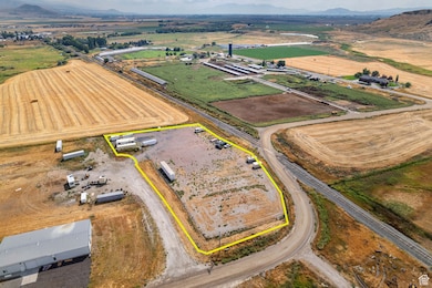 View of rural area with property boundaries highlighted and a mountain backdrop