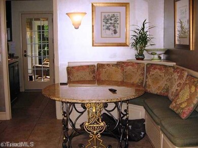 Breakfast. breakfast room with table and granite top and seats, that stay with home