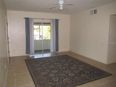 LIVING ROOM WITH SLIDING GLASS DOOR