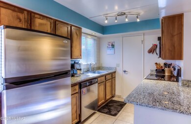 Rich Wood Cabinets & Granite Counters