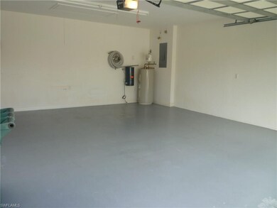Large  two-car garage with sealed and painted floor.