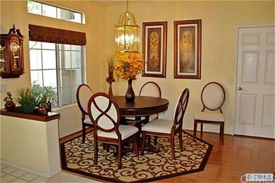 Tile entry, wood style dining room floor.  Giant c