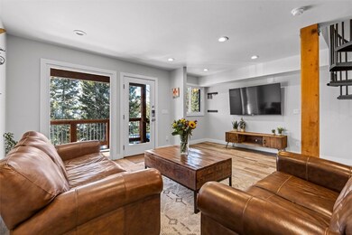 Living room with recessed lighting, light wood-typ