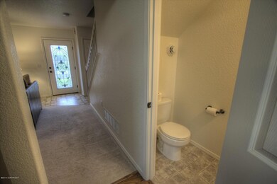 Hall to front entry & half bath on main
