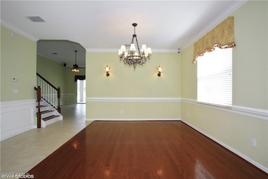 Formal Dining Room with Hardwood Floors