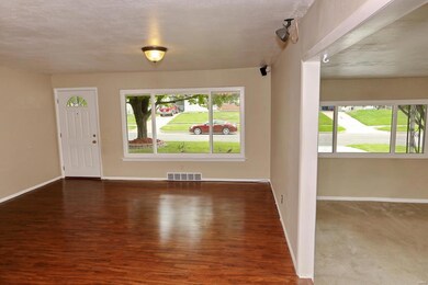 Large, vinyl thermal windows are found throughout 