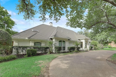 View of front of property with circle driveway