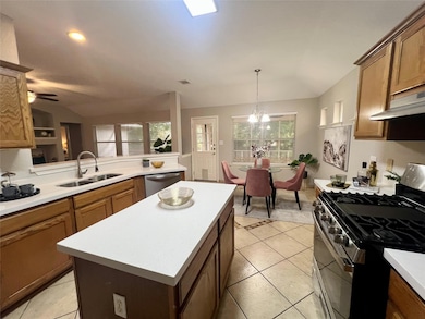 Kitchen with stainless steel appliances, lofted c