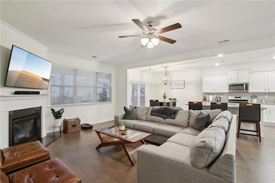 Living room with hardwood / wood-style flooring, c