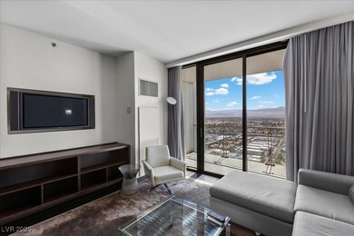 Living area with floor to ceiling windows