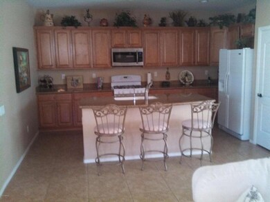 MAPLE CABINETS WITH GRANITE IN KITCHEN