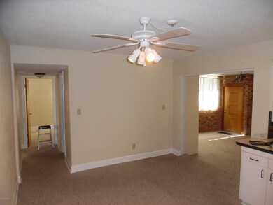 Fam.Rm. towards kit. and encl. porch