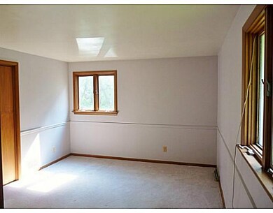 Master Bedroom. A spacious Carpeted Master Bedroom