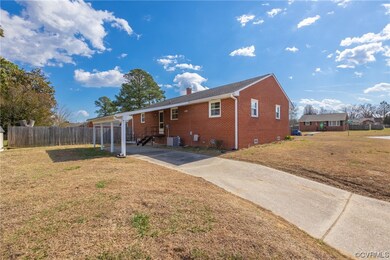 Side entry driveway leads into back door or baseme