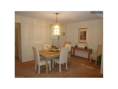 Formal dining room off kitchen and living room