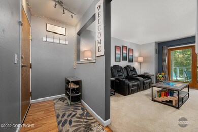 View of Condo entry and Living Room