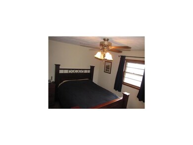 Master Bedroom. The master bedroom currently accom