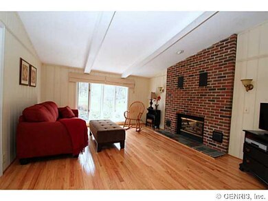 Family Room Family Room boasts gas f/p, exposed be