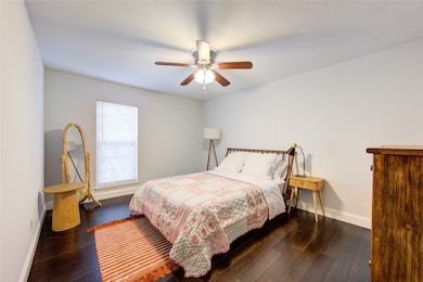 The primary bedroom is spacious and is complete with an ensuite bathroom and walk-in closet