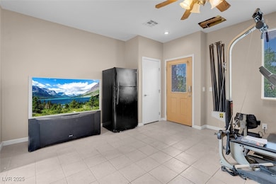Workout area with light tile patterned floors, cei