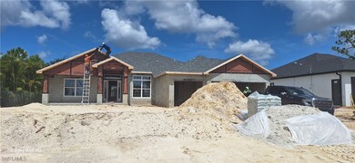 Unfinished property featuring a shingled roof, a g