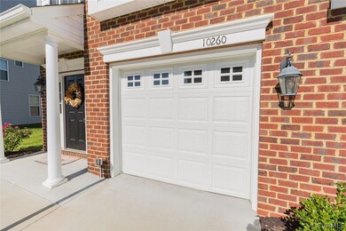 Direct entry garage with automatic door opener.