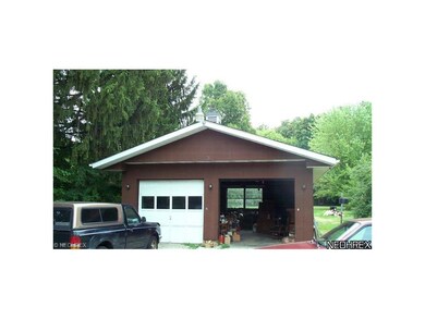 30 x 24 Garage with 9' doors, heat, and 220.