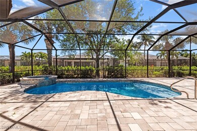 View of pool featuring a pool with connected hot t