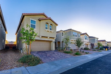 Mediterranean / spanish house with a residential view, stucco siding, a garage, driveway, and a tile roof