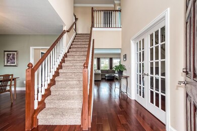 Hardwood Floor Entry With French Doors t