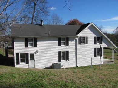 This western view of the home shows its expansive size with over 2700 square feet for $99,500!  That figures to $36.69 per square foot in move-in ready condition! Don't delay - call today!