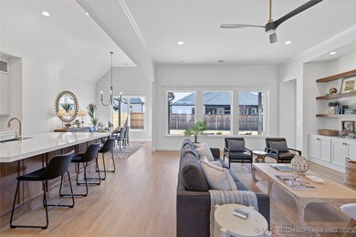 Family room and adjacent kitchen...Wall of Windows