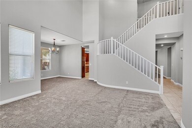 Formal dining room & staircase.
