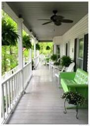 What a wonderful porch to sip your morning coffee 