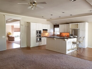 Large WHITE kitchen open to the 2nd living area