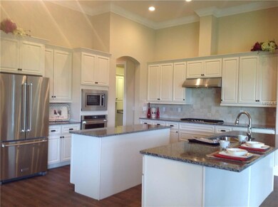 KITCHEN with island - stainless appliances/gas cooking and extra  seating