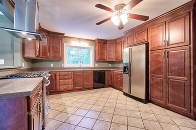 Tile Floor, Fehrenbacher Cabinetry, Corian Counter
