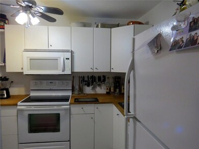 Kitchen with flat top range.