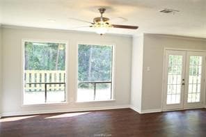 Doorway to outside with wood finished floors, visi
