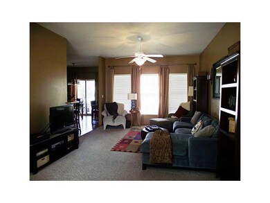 Living Room. Living room flows into kitchen and di