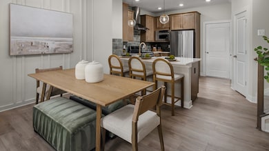 Dining Space Opening to the Gourmet Kitchen