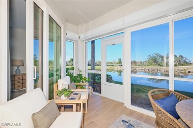 Sunroom / solarium with a water view